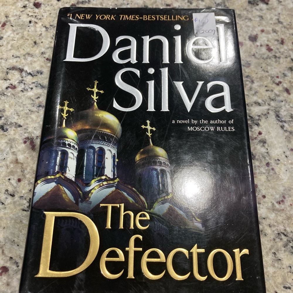 Preowned The Defector by Daniel Silva in hardcover